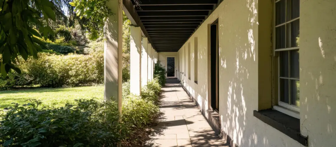 Professional conducting retrospective property valuation for an Adelaide home